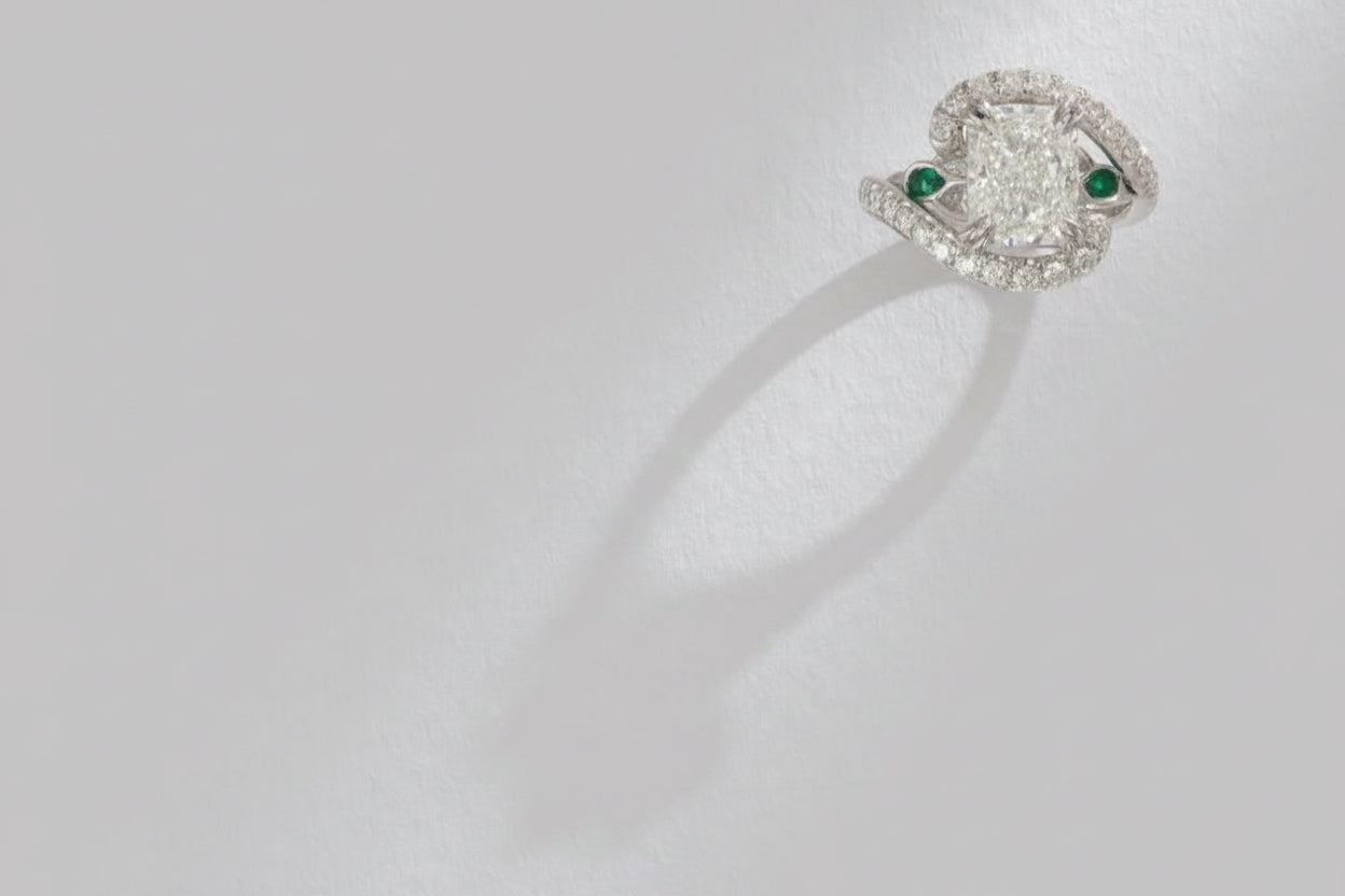 One-of-a-Kind Radiant Diamond Ring with Emerald Sidestones