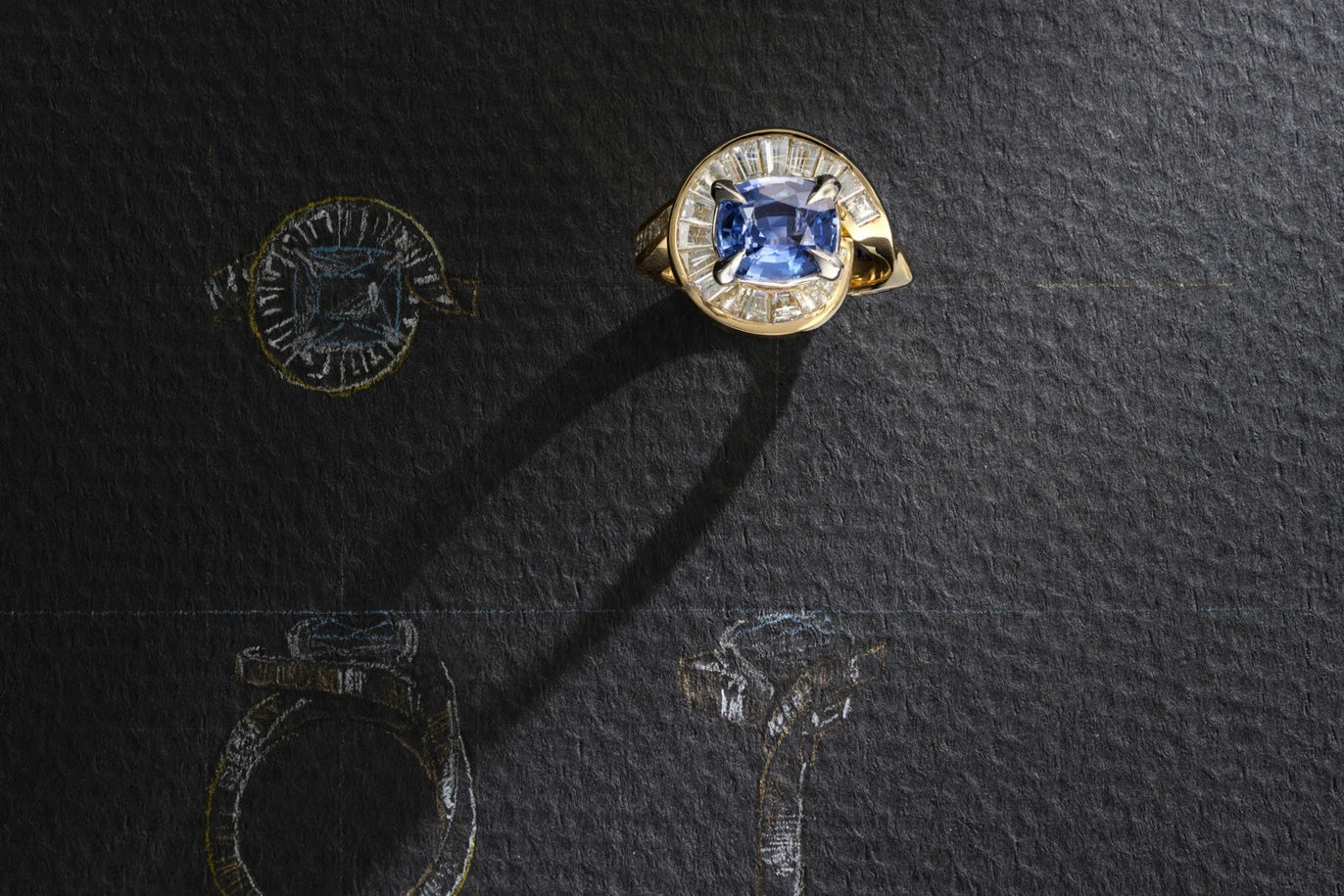 One-of-a-Kind Blue Sapphire Ring with Diamond Baguette Halo and Channel