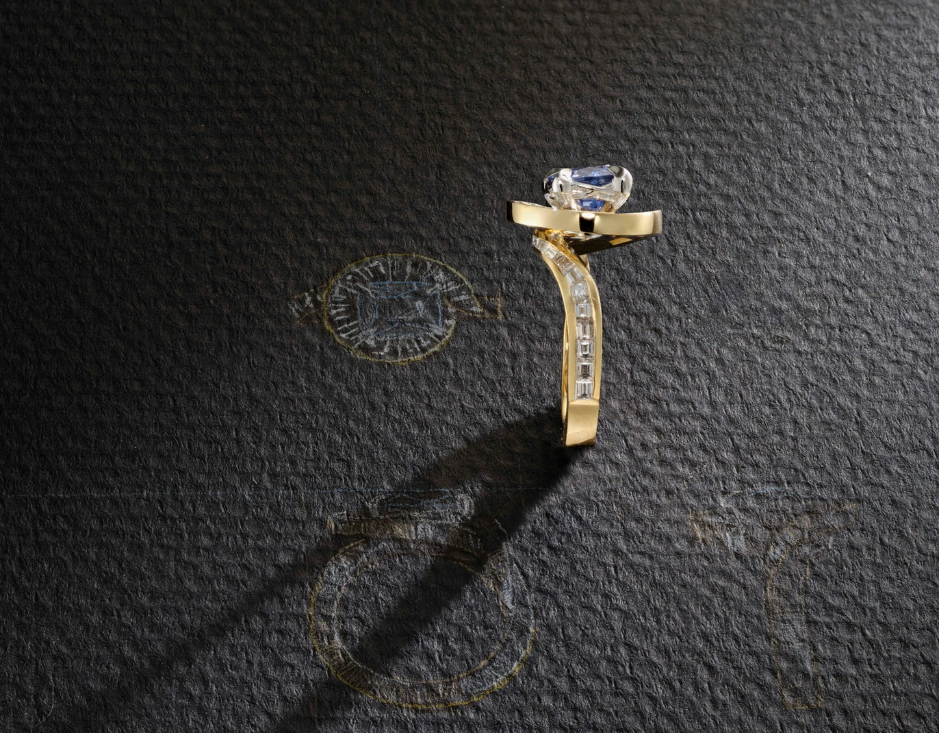 One-of-a-Kind Blue Sapphire Ring with Diamond Baguette Halo and Channel