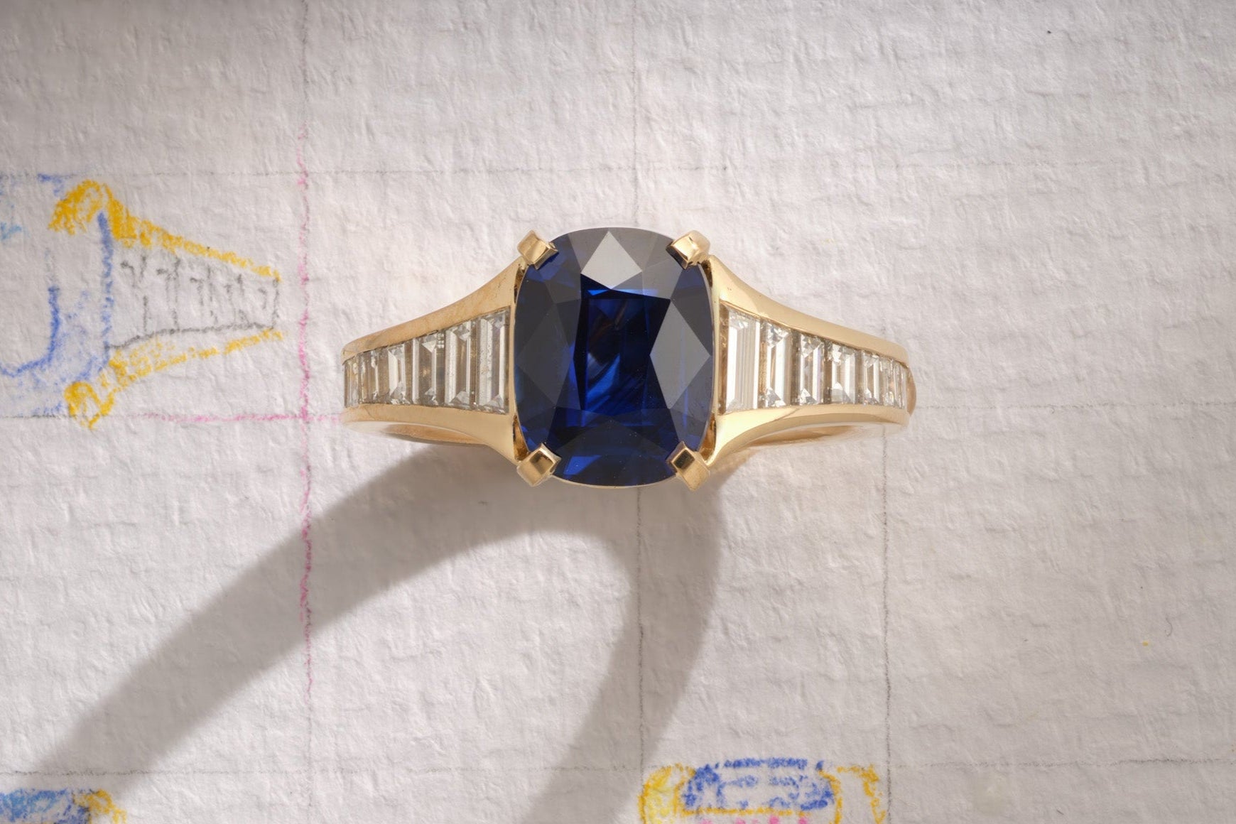 One-of-a-Kind Blue Sapphire Ring with Diamond Channel