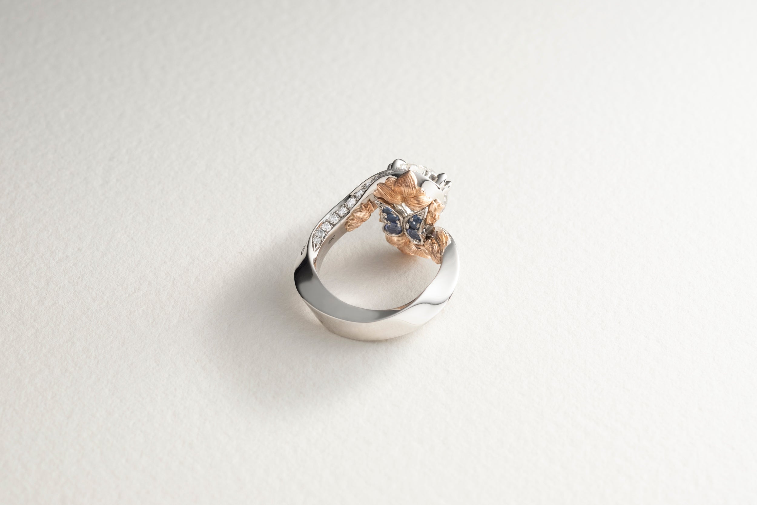 One-of-a-kind Diamond Pear Ring with butterfly finger rest