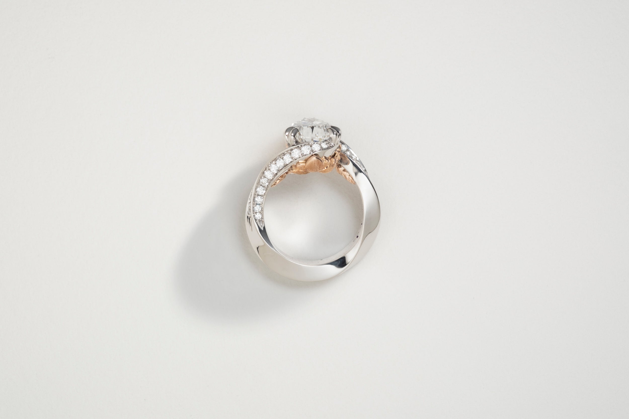 One-of-a-kind Diamond Pear Ring with butterfly finger rest