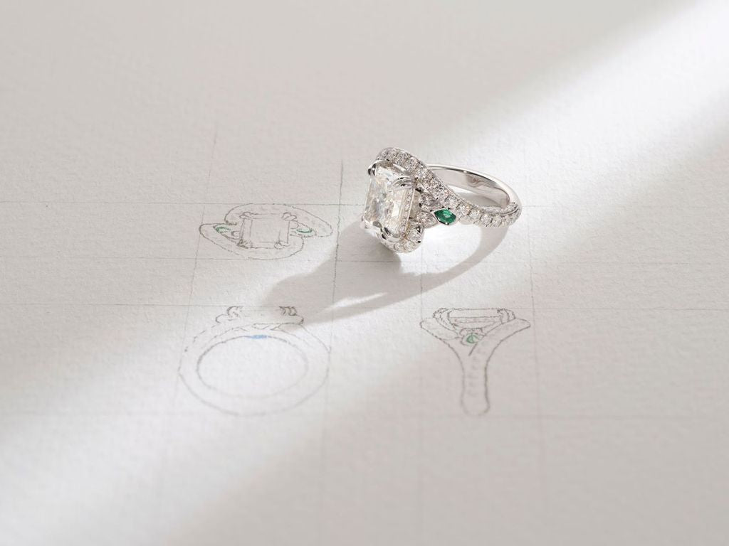 One-of-a-Kind Radiant Diamond Ring with Emerald Sidestones