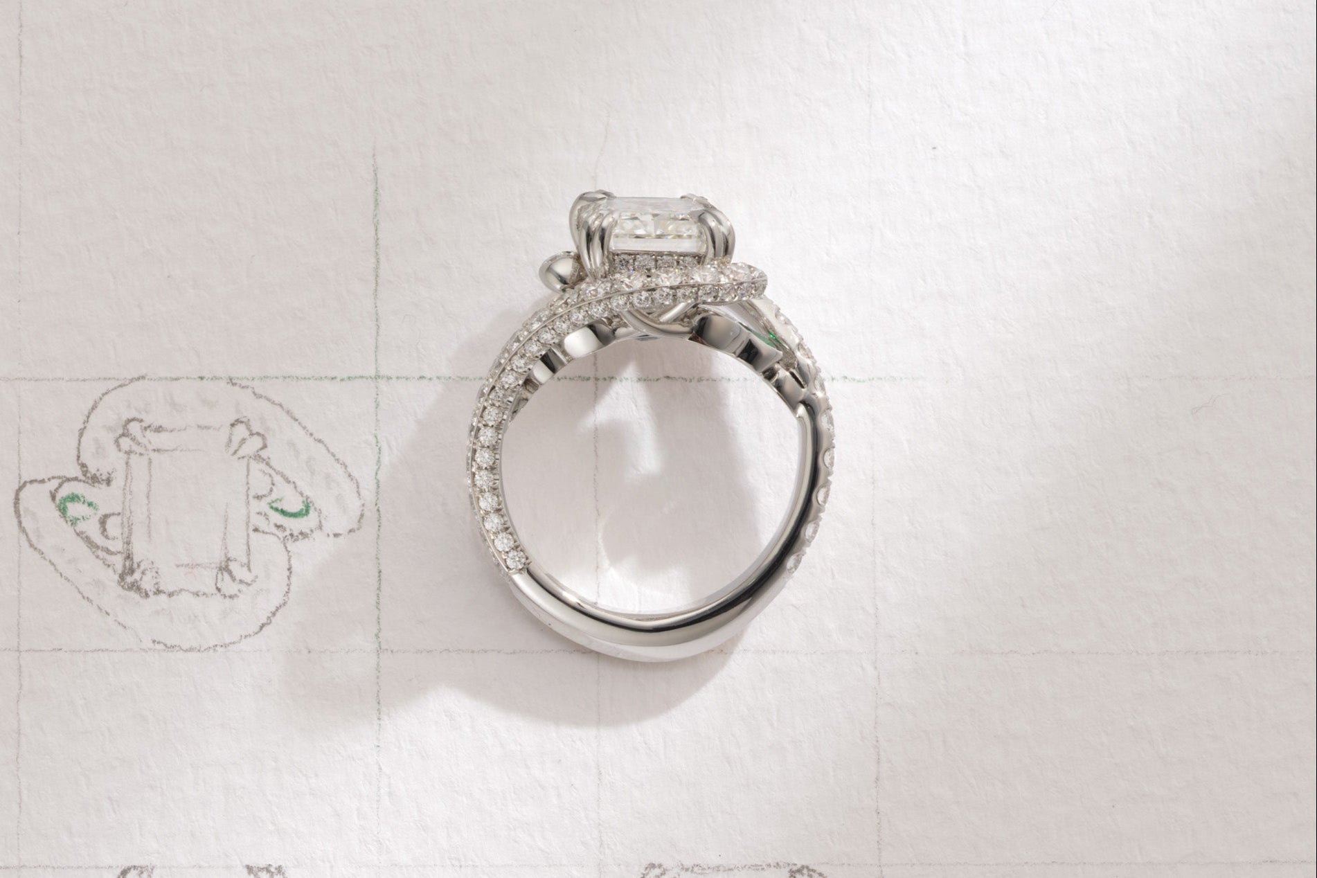 One-of-a-Kind Radiant Diamond Ring with Emerald Sidestones